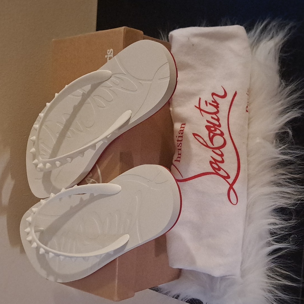Louboutin flip flops white